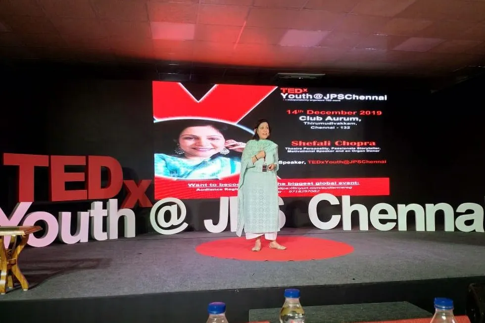 Shefali Chopra speaking on the red circle at TEDxYouth@JPSChennai